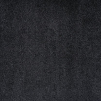 Canapé à oreilles hautes capitonné en velours noir